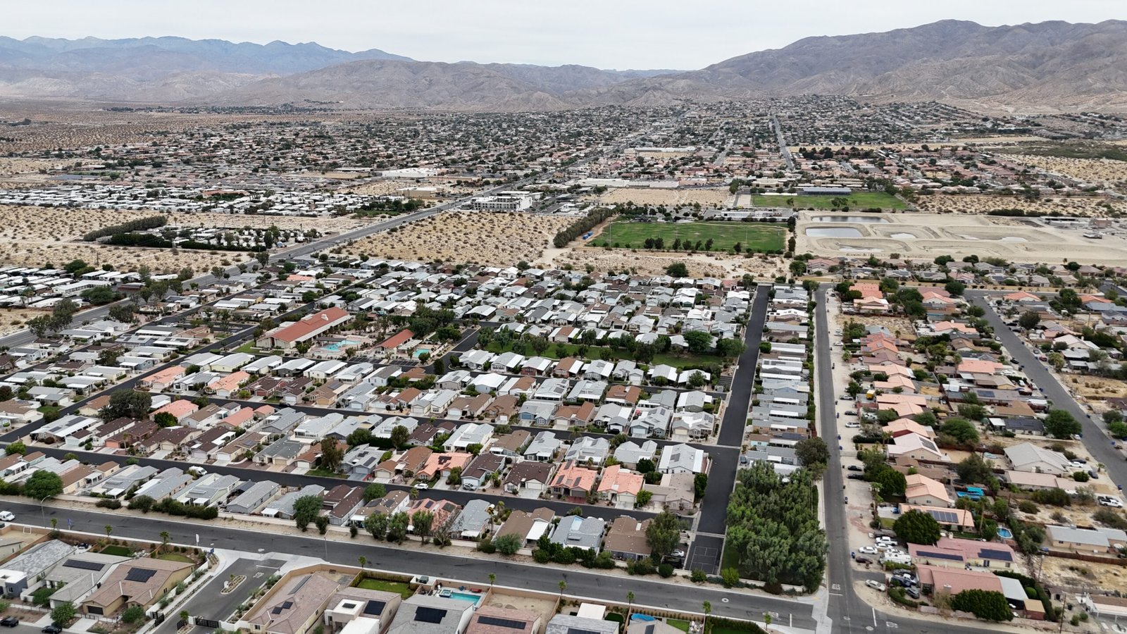 Sell my house fast Desert Hot Springs — aerial drone photo of a residential property